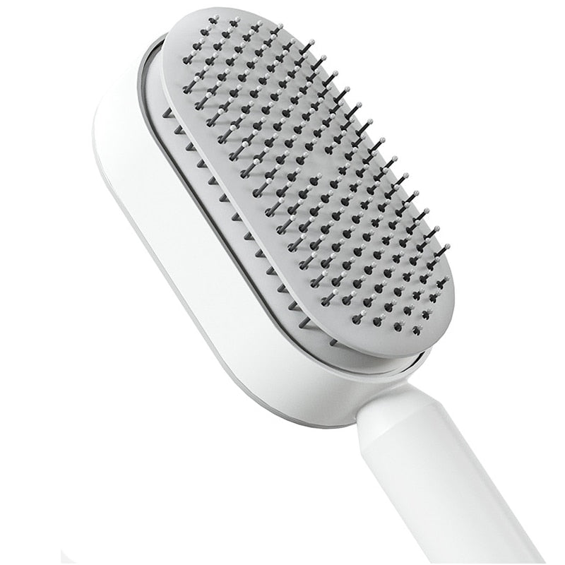 Brosse à cheveux antistatique autonettoyante