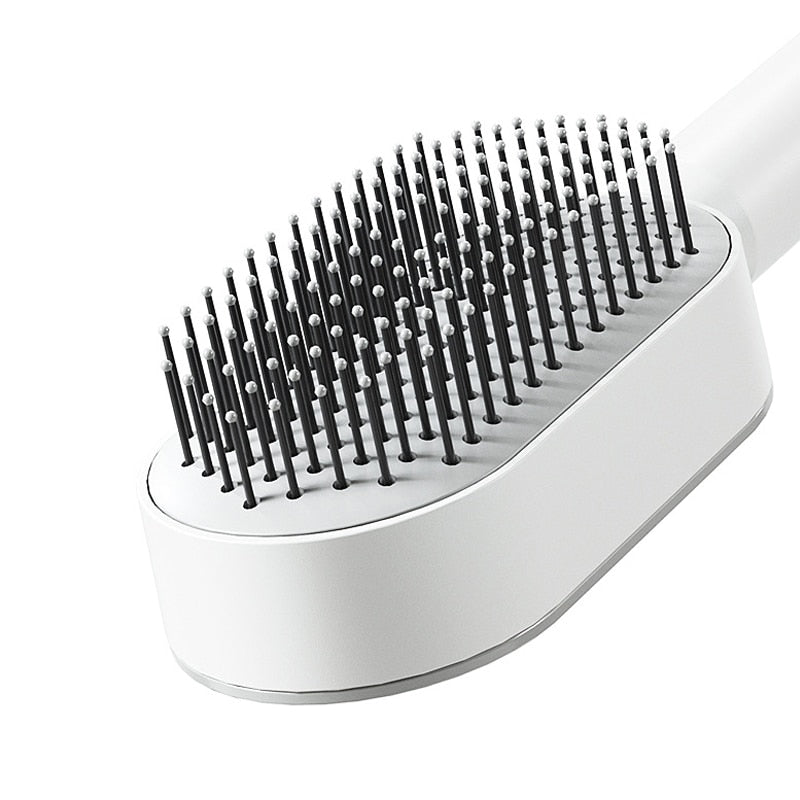 Brosse à cheveux antistatique autonettoyante